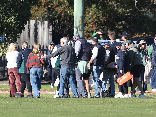 Patrick Shirlow is taken off on a stretcher. Picture: Alan Barber