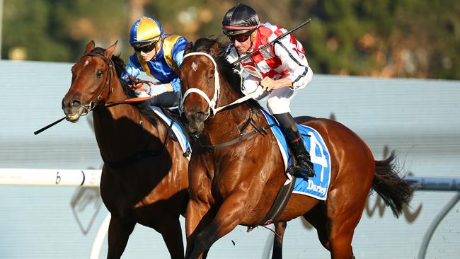 Nash Rawiller and Waterford (outside) get the better of Iknowastar to win at Rosehill. Picture: Getty Images