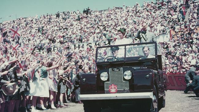 Queen Elizabeth II and Prince Philip wave to the crowd whilst on their Commonwealth visit to Australia, 1954. Picture: Getty Images.