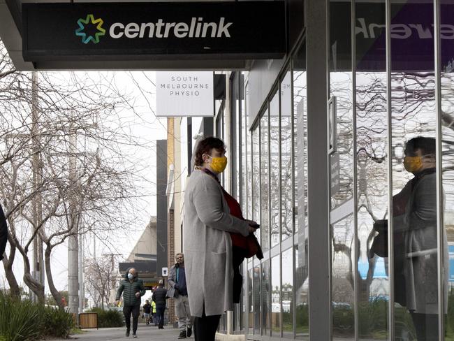 MELBOURNE, AUSTRALIA - NewsWire Photos AUGUST  31 2020: A woman waits outside Centrelink in South Melbourne on Monday during stage 4 COVID-19 lockdowns across Melbourne.Picture: NCA NewsWire / David Geraghty