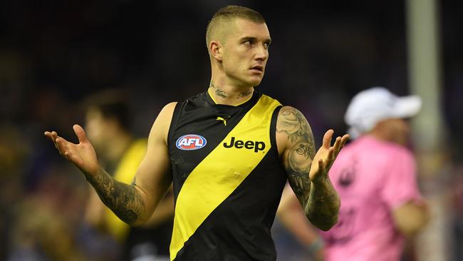 Four Richmond players were turned away from a school footy clinic on Tuesday. (AAP Image/Julian Smith)