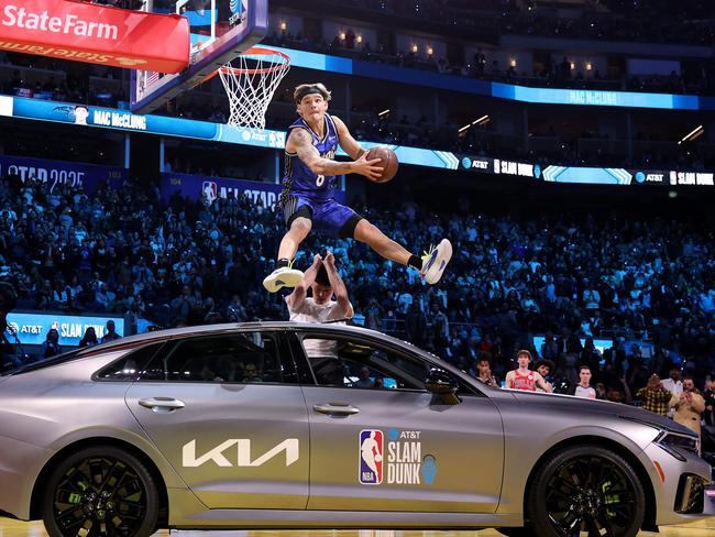 SAN FRANCISCO, CALIFORNIA - FEBRUARY 15: Mac McClung #0 of the Osceola Magic dunks the ball during the 2025 AT&T Slam Dunk Contest as part of the State Farm All-Star Saturday Night at Chase Center on February 15, 2025 in San Francisco, California. NOTE TO USER: User expressly acknowledges and agrees that, by downloading and or using this photograph, User is consenting to the terms and conditions of the Getty Images License Agreement.   Ezra Shaw/Getty Images/AFP (Photo by EZRA SHAW / GETTY IMAGES NORTH AMERICA / Getty Images via AFP)