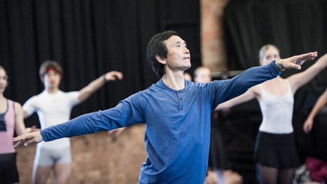 Li Cunxin with dancers of the Queensland Ballet