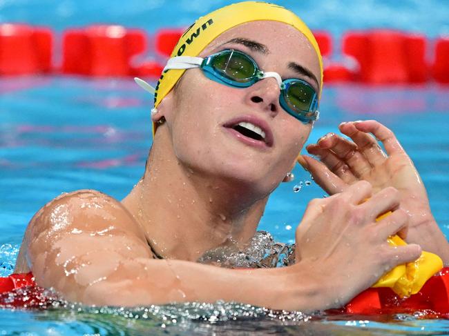 Australia's Kaylee McKeown reacts after competing in a semifinal of the women's 200m backstroke swimming event during the Paris 2024 Olympic Games at the Paris La Defense Arena in Nanterre, west of Paris, on August 1, 2024. (Photo by FranÃ§ois-Xavier MARIT / AFP)