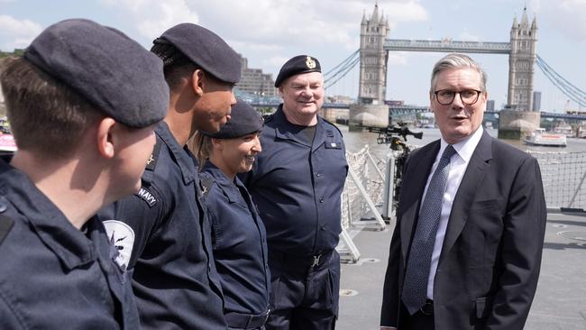 Britain's Prime Minister Keir Starmer talks with members of Britain's Royal Navy during a visit aboard the Type 23 Frigate, HMS Sutherland. Picture: AFP