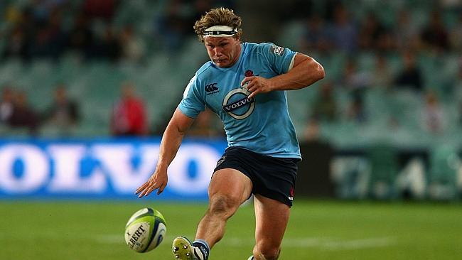 SYDNEY, AUSTRALIA - APRIL 19: Michael Hooper of the Waratahs kicks ahead during the round 10 Super Rugby match between the Waratahs and the Bulls at Allianz Stadium on April 19, 2014 in Sydney, Australia. (Photo by Cameron Spencer/Getty Images)