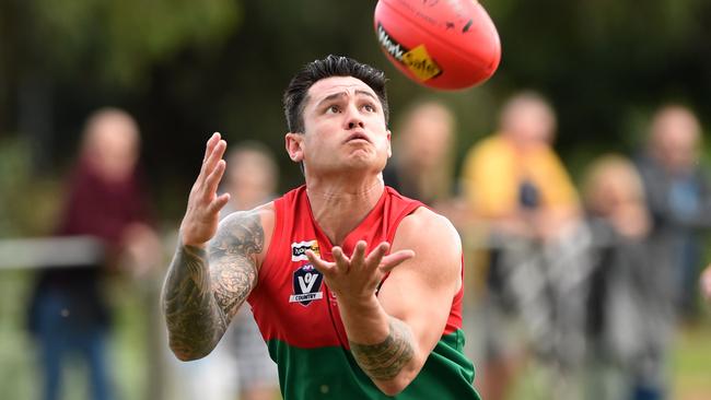 Pines forward Aaron Edwards hauls in another mark. The ex-AFL player will return from injury late in the 2018 season. Picture: Chris Eastman