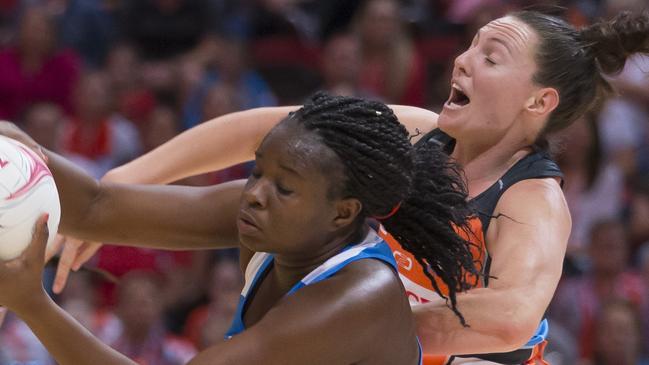 Sam Poolman, right, battling with Sam Wallace of the Swifts in a recent Super Netball tussle.