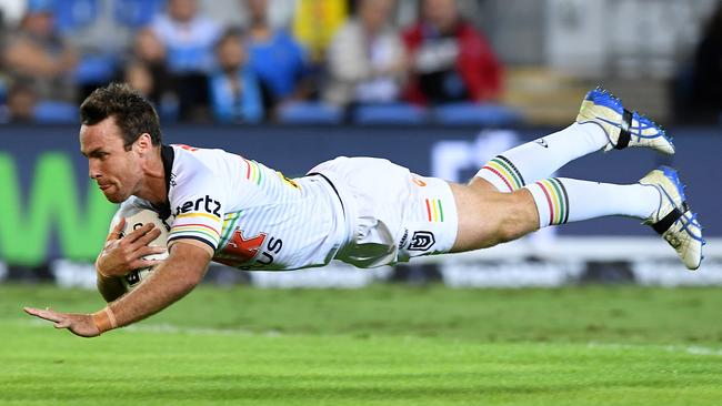 James Maloney gets in for a try at Cbus Super Stadium. Picture: AAP Image/Dave Hunt