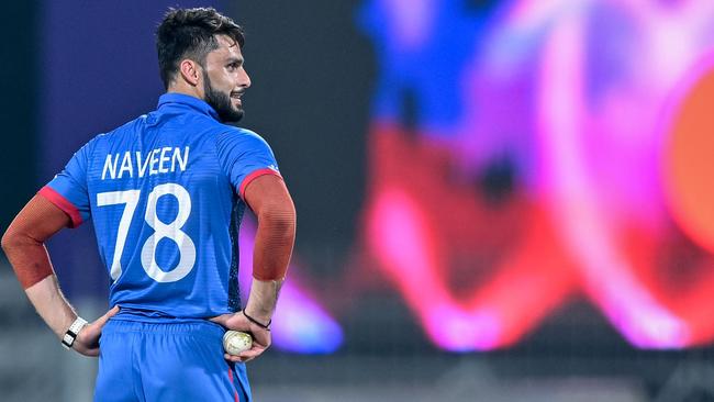 Afghanistan's Naveen-ul-Haq gestures during the 2023 ICC Men's Cricket World Cup one-day international (ODI) match between New Zealand and Afghanistan at the MA Chidambaram Stadium in Chennai on October 18, 2023. (Photo by R.Satish BABU / AFP) / -- IMAGE RESTRICTED TO EDITORIAL USE - STRICTLY NO COMMERCIAL USE --