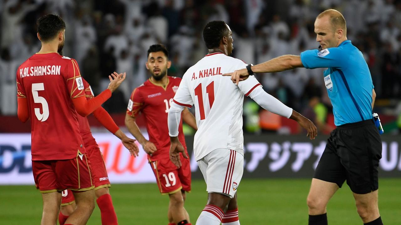 Jordanian referee Adham Makhadmeh calls for a penalty during the 2019 AFC Asian Cup football game between United Arab Emirates and Bahrain at the Zayed sports city stadiuam in Abu Dhabi on January 05, 2019. (Photo by Khaled DESOUKI / AFP)