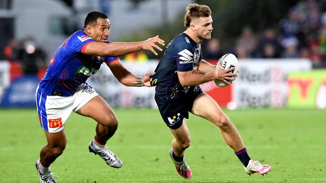 Melbourne’s electric fullback Ryan Papenhuyzen tries to evade the Newcastle defence at Sunshine Coast Stadium. Picture: Getty Images