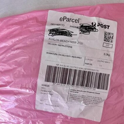 This dodgy parcel, filled with junk, was sent to an address at Avalon Beach from the Melbourne suburb of Dingley Village. Picture: Facebook