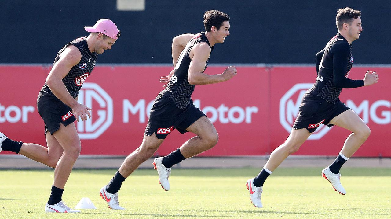 Orazio Fantasia leads Connor Rozee and Dan Houston at Port Adelaide training ahead of the clash with Fremantle. Picture: Sarah Reed