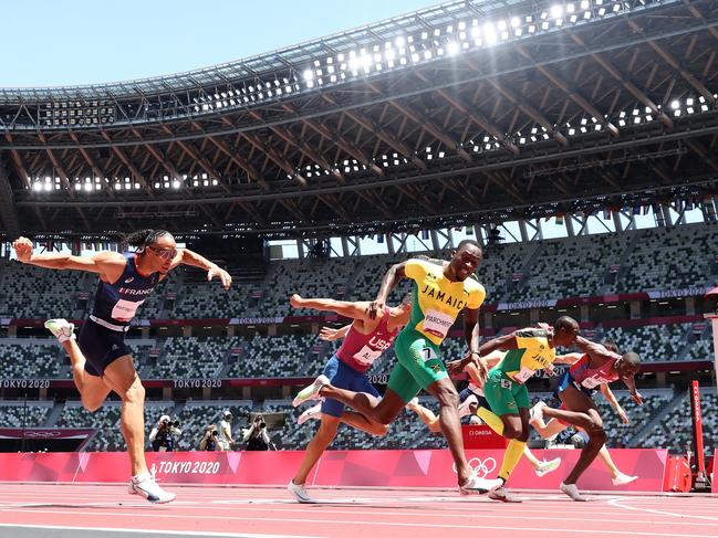 Hansle Parchment (C) of Team Jamaica finishes first ahead of Grant Holloway of Team United States. Picture: Getty Images