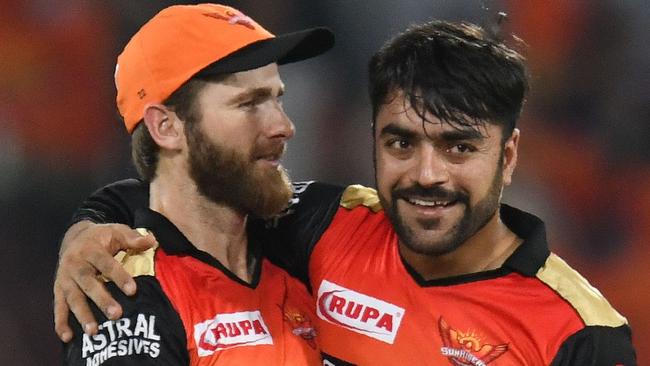 Rashid Khan celebrates with his Kane Williamson after a wicket in the IPL. Picture: AFP Photo