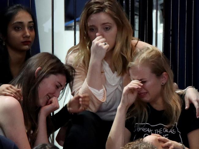 A group of women react as voting results come in at Democratic presidential nominee former Secretary of State Hillary Clinton's election night event. Picture: Getty