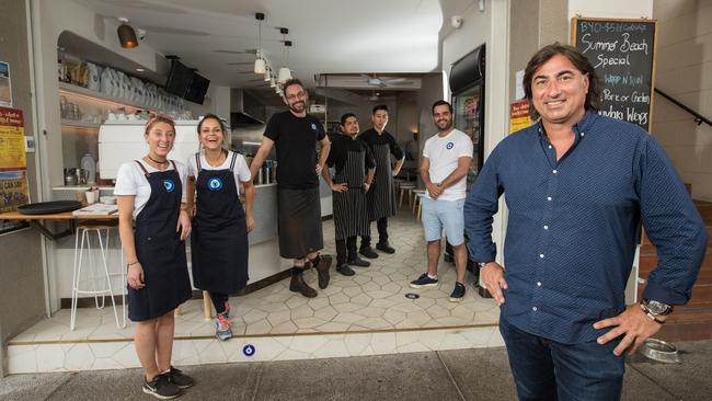 Owner Peter Papas and staff outside the new Kazzi Beach Greek. Picture: Julian Andrews