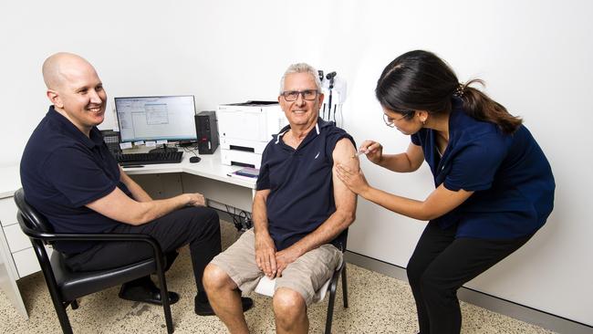 Nurse Luna Reisenbauer gives Clyde Riches, 69, his Covid jab at Slacks Creek Respiratory Clinic. Picture: Nigel Hallett