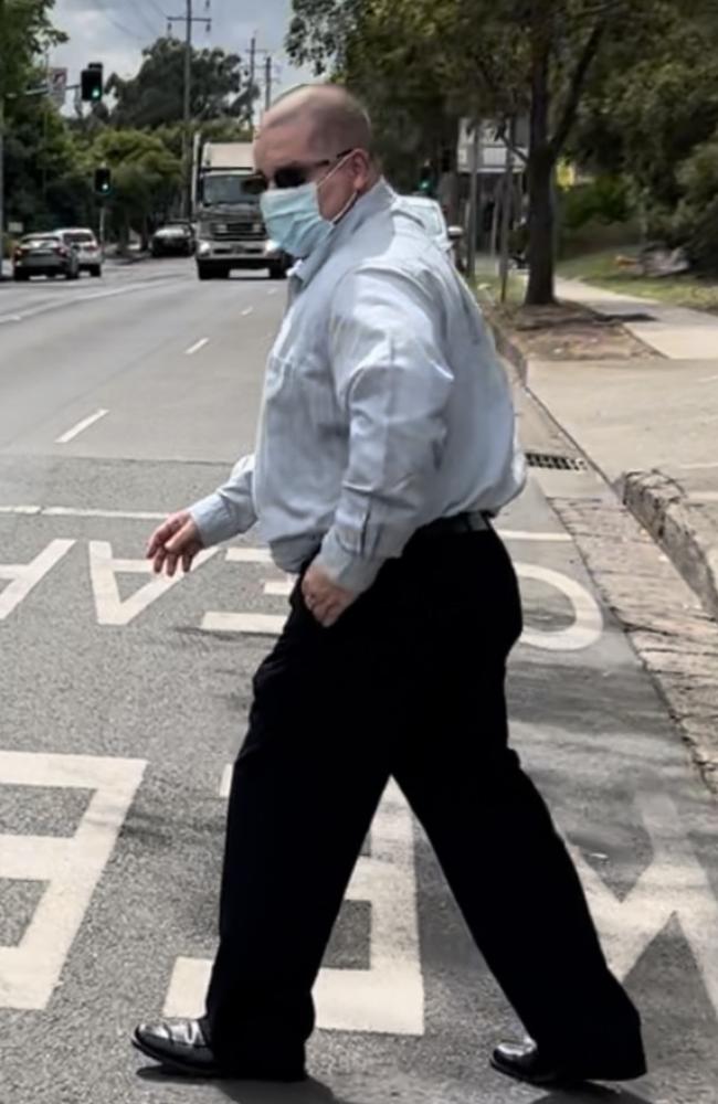 Former corrections officer Scott Hawken runs from Penrith Court after being hit with additional charges. Picture: Jake McCallum