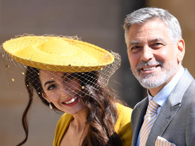 George and Amal Clooney arrive at St George’s Chapel.  Picture: MEGA