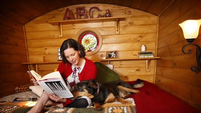 Danielle Wood in her writing studio, a Gypsy Caravan.