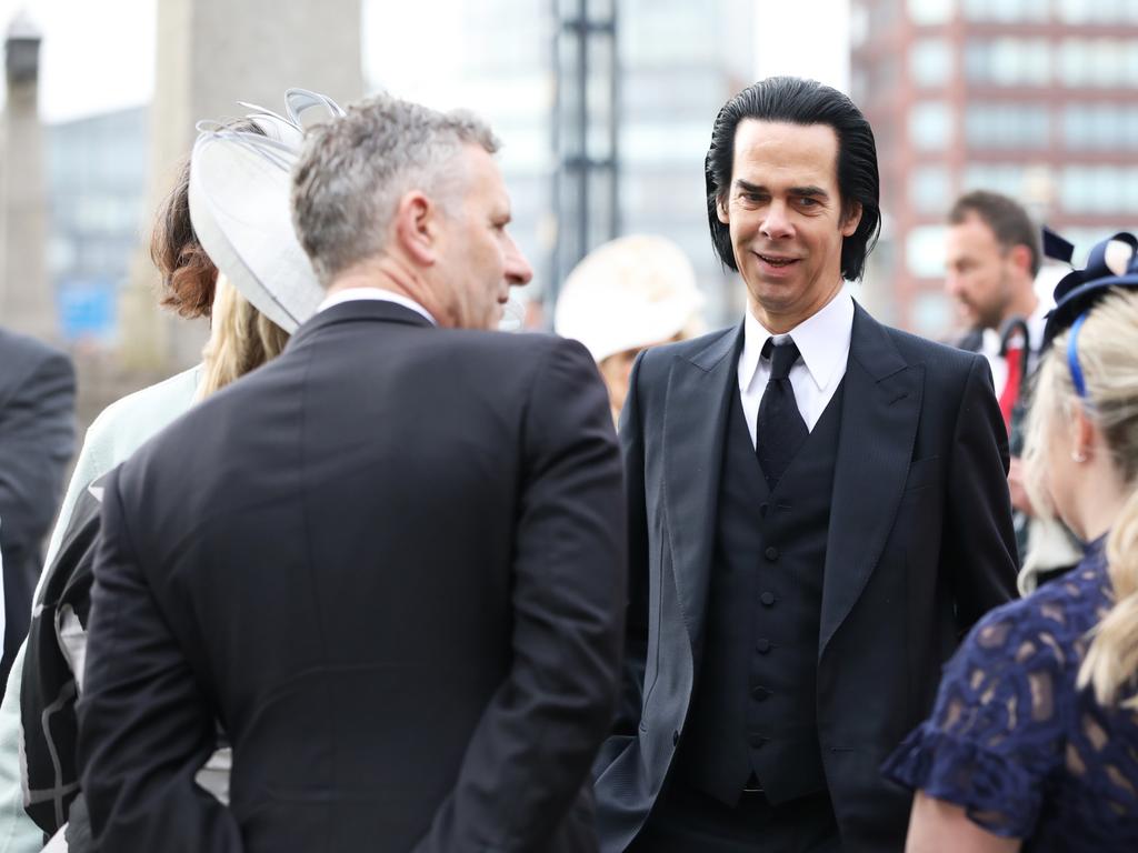 Nick Cave with Team Australia at the coronation. Picture: Ella Pellegrini