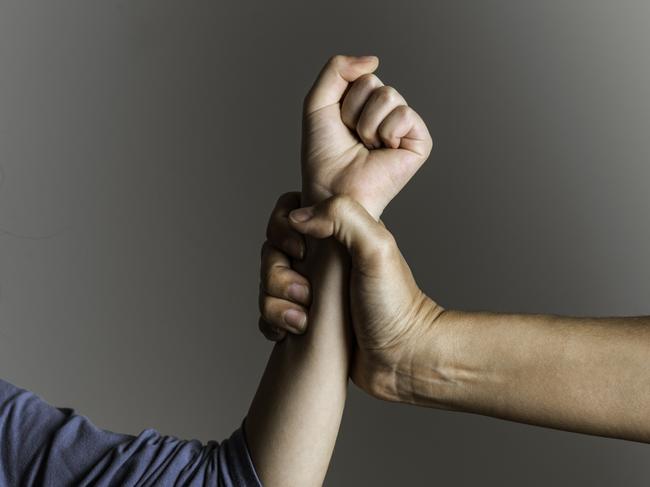 istock generic:  woman, abuse, DV, domestic violence, harassment, sexual harassment.   Parent is holding her little girls arm and is about to use violence. Representing child abuse and domestic violence. . Picture: istock