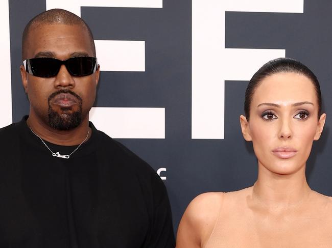 PIXELATED VERSIONS -  LOS ANGELES, CALIFORNIA - FEBRUARY 02: (EDITOR'S NOTE: Image contains nudity.) L-R, Kanye West and Bianca Censori attend the 67th Annual GRAMMY Awards on February 02, 2025 in Los Angeles, California.  (Photo by Matt Winkelmeyer/Getty Images for The Recording Academy)