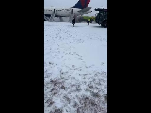 Passengers Evacuated Onto Snowy Atlanta Runway Following Engine Fault