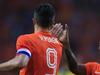 Netherlands' Robin van Persie, left, and Netherlands' Georginio Wijnaldum, right, celebrate after van Persie scored 1-1during the international friendly soccer match between Netherlands and Ecuador at ArenA stadium in Amsterdam, Netherlands, Saturday, May 17, 2014. (AP Photo/Peter Dejong)