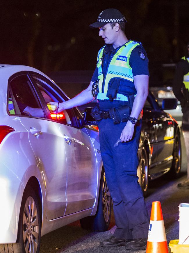 Police during a roadside testing operation in Altona. Picture: Sarah Matray