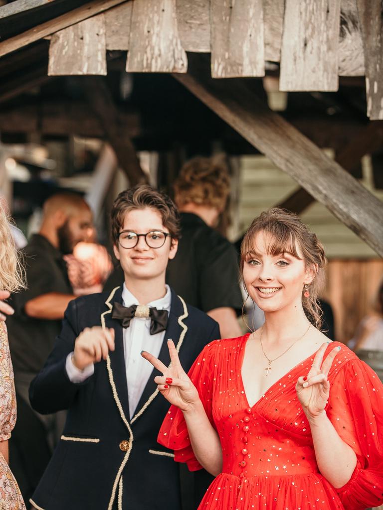 Glasshouse Christian College students Alison Caust and Briony Spencer giving the victory sign for a perfect Year 12 formal. Picture: Jordan Bull