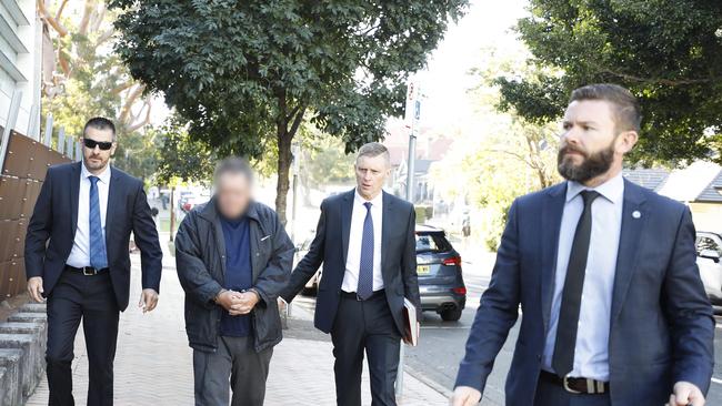 Detective Sergeant John Breda, Detective Chief Inspector Peter Yeomans and Detective Senior Constable Tim Carey arrested Scott Phillip White. Picture: NSW Police