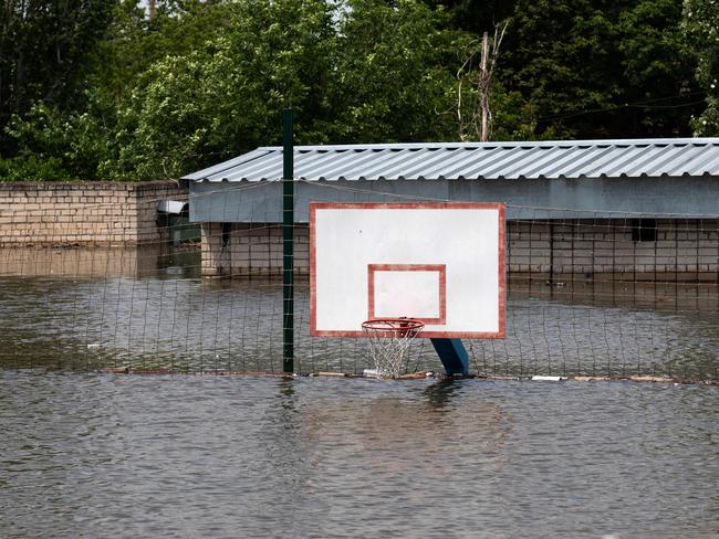 A submerged basketball court in Kherson after floodwaters engulfed the city. Picture: AFP