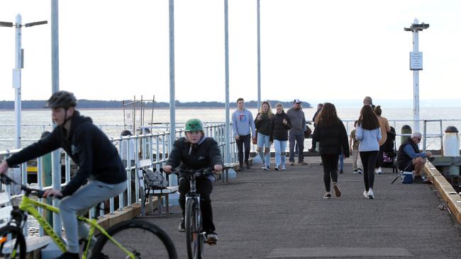 Crowds of people in Cowes on Phillip Island, while the rest of Melbourne is locked down. Picture: Alex Coppel.