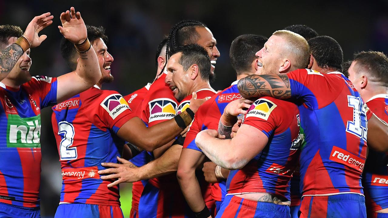 Knights celebrate after their victory during the round 24 NRL match between the Newcastle Knights and the Gold Coast Titans at Sunshine Coast Stadium, on August 26, 2021, in Sunshine Coast, Australia. (Photo by Albert Perez/Getty Images)