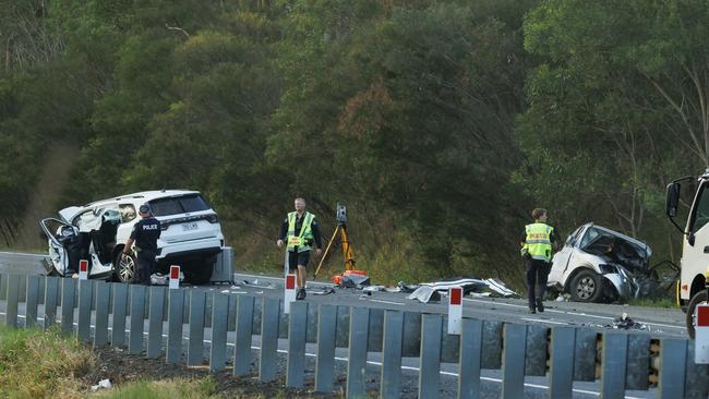 Police at the scene of the fatal car crash on the D'Aguilar Highway west of Wamuran on Sunday afternoon. Picture Lachie Millard