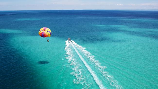 The perspective parasailing at Moreton Island is hard to beat. Photo: Mark Higgins