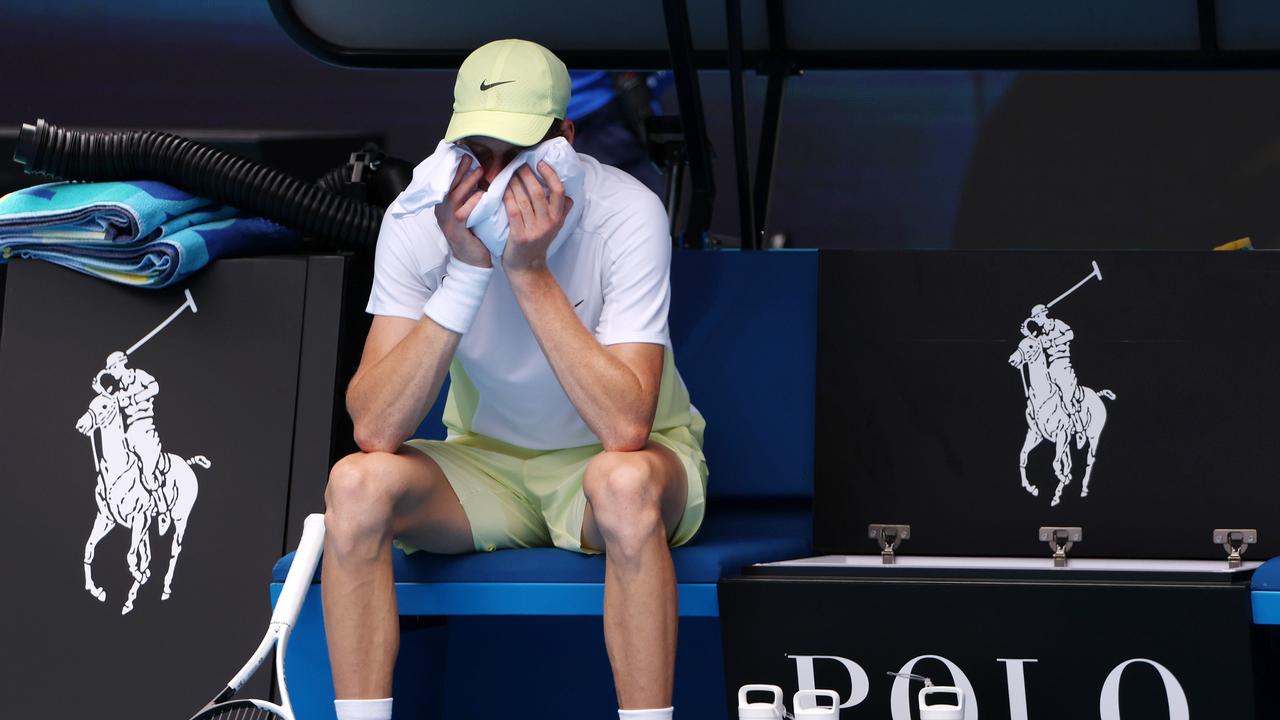 Jannik Sinner struggles with the heat during his fourth-round win over 13th seed Holger Rune. Picture: Mark Stewart