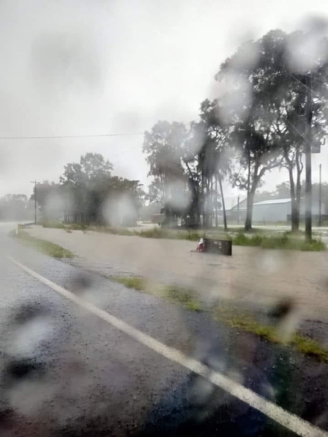 Flash flooding on Moore Park Beach Road.