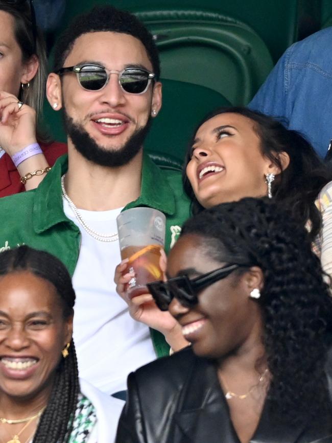 The pair were getting cosy at the tennis. (Photo by Karwai Tang/WireImage)