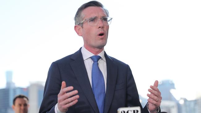 Premier Dominic Perrottet was smacked down by the prime minister over international borders. Picture: NCA NewsWire / Christian Gilles