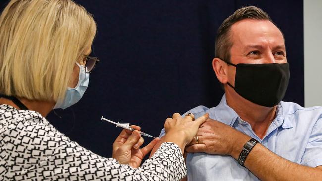 Tracey Morris gives the jab to WA Premier Mark McGowan. Picture: Colin Murty