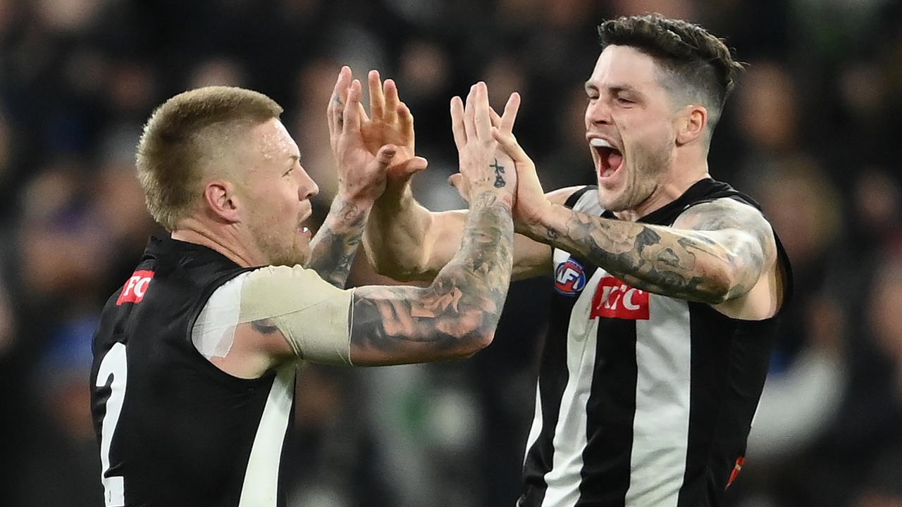 Jack Crisp (right) is confident Jordan de Goey will stay a Magpie. Picture: Quinn Rooney/Getty Images