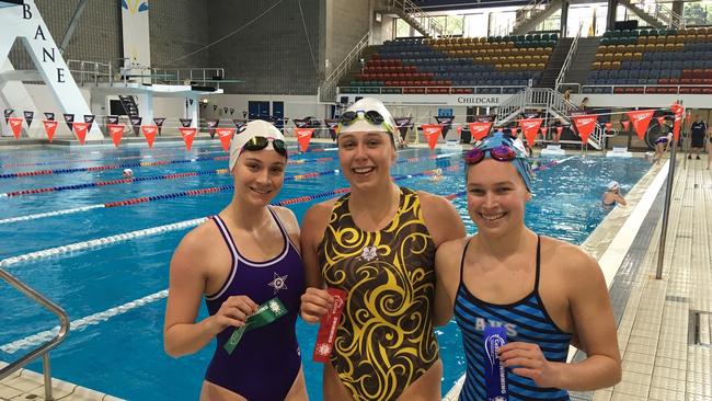 Sophie Gahan, left, Amelia Watt and Piper Brien after the under 19 50m dash.