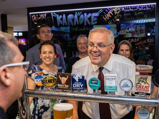 Prime Minister Scott Morrison at Cazalys Palmerston Club to play Two Up on ANZAC day in Darwin NT. The latest Newspoll indicates he is the preferred prime minister. Picture: Jason Edwards