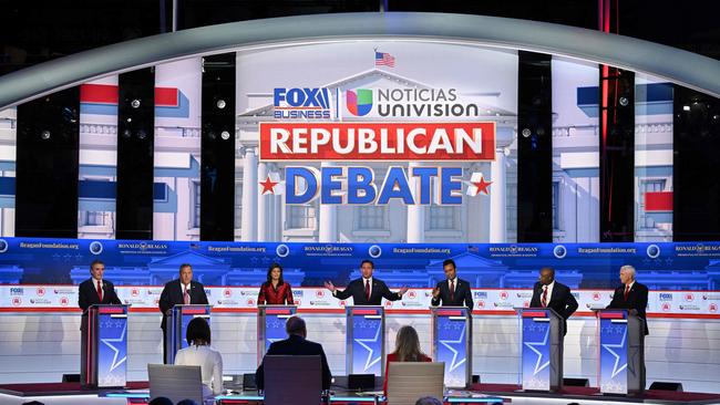 From left: Doug Burgum, Chris Christie, Nikki Haley, Ron DeSantis, Vivek Ramaswamy, Tim Scott and Mike Pence at the Ronald Reagan Presidential Library in Simi Valley, California, on Wednesday night. Picture: AFP