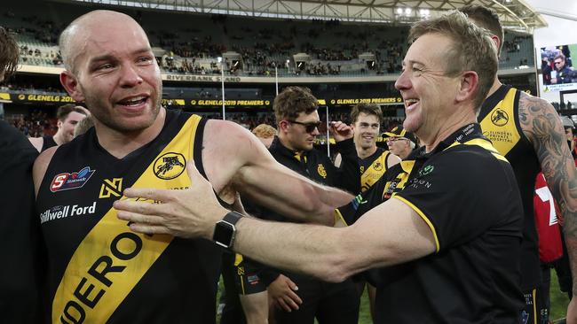 Aaron Joseph celebrates the 2019 grand final win with coach Mark Stone. Picture: Sarah Reed