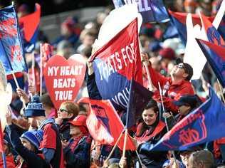 HEART BEATS TRUE: Demons fans have every right to celebrate their club's return to finals footy. Picture: JULIAN SMITH